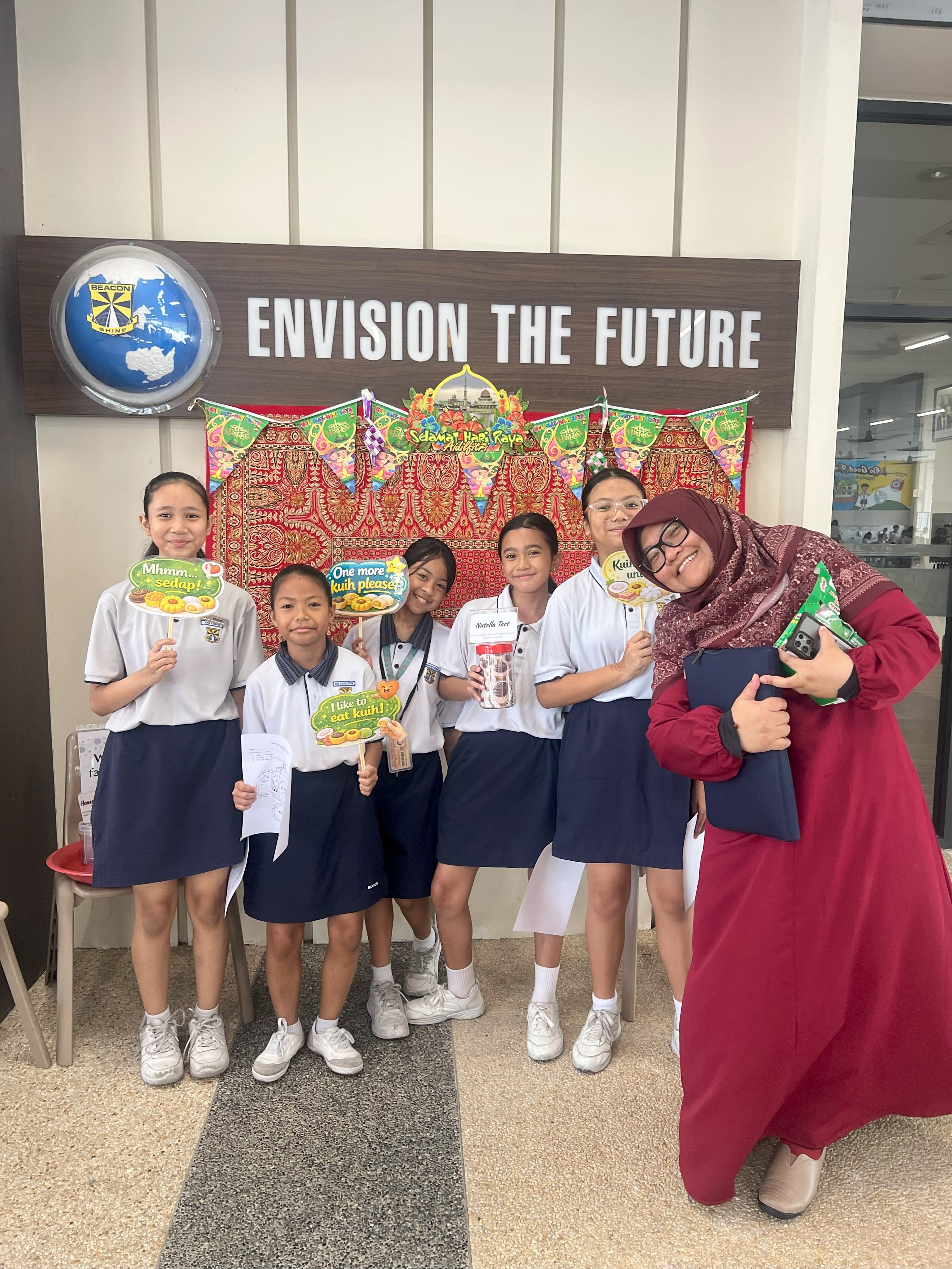 Trying on various kuih during recess 